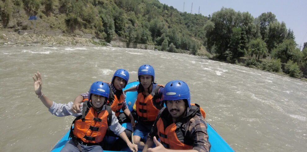 Tourists rafting on the Beas River in Kullu, Himachal Pradesh